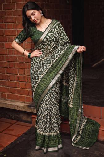 Women polyester viscose chanderi ikkat printed saree with zari border