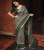 Women polyester viscose chanderi ikkat printed saree with zari border