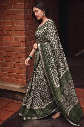 Women polyester viscose chanderi ikkat printed saree with zari border