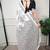 printed satin saree with elegant pearl lace border