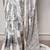 printed satin saree with elegant pearl lace border