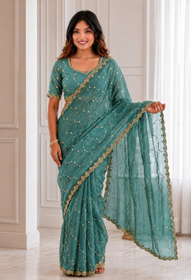 fetching sea-green embroidery work with real bits work fendy satin latest designer indian saree 1