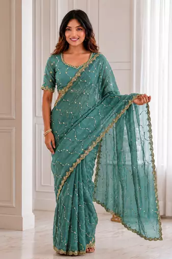 fetching sea-green embroidery work with real bits work fendy satin latest designer indian saree