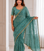 fetching sea-green embroidery work with real bits work fendy satin latest designer indian saree