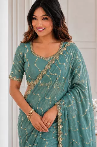 fetching sea-green embroidery work with real bits work fendy satin latest designer indian saree