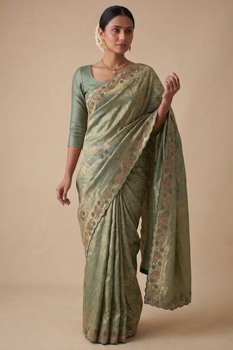 enthralling sea-green embroidery work with real bits work banarasi silk blend latest designer indian saree