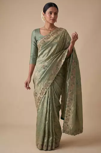 enthralling sea-green embroidery work with real bits work banarasi silk blend latest designer indian saree