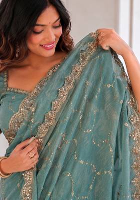 fetching sea-green embroidery work with real bits work fendy satin latest designer indian saree 4