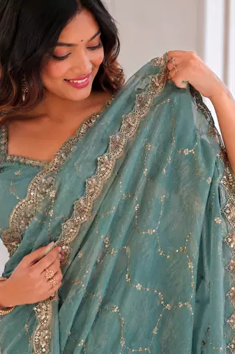 fetching sea-green embroidery work with real bits work fendy satin latest designer indian saree