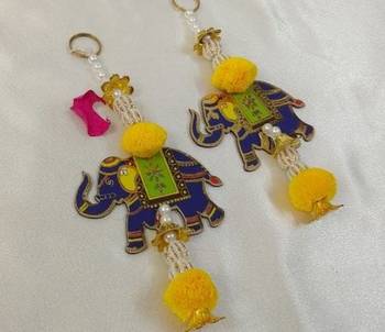 handmade mdf elephant bead hanging decoration for festive home decor pack of 2 1