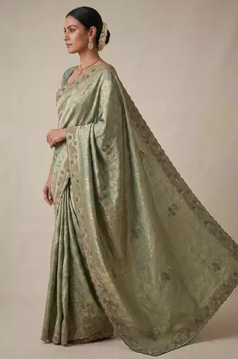 enthralling sea-green embroidery work with real bits work banarasi silk blend latest designer indian saree