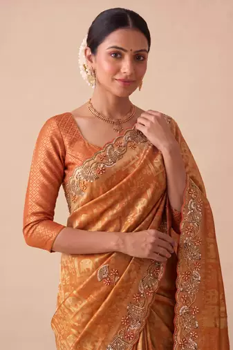 ravishing rust orange embroidery work with real bits work banarasi silk blend latest designer indian saree