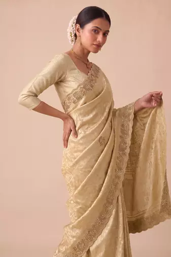 irresistible biege embroidery work with real bits work banarasi silk blend indian saree