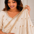 catching off-white embroidery work with real bits work fendy satin indian saree