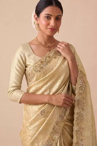 irresistible biege embroidery work with real bits work banarasi silk blend indian saree
