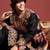 Men ethnic motifs embroidered pleated mirror work kediya set with cap & dandiya