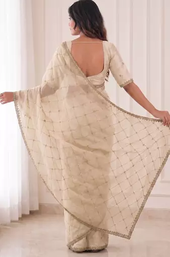 catching off-white embroidery work with real bits work fendy satin indian saree