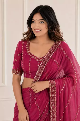 glamourous rani-pink embroidery work with real bits work fendy satin indian saree