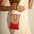 Red satin sling bag