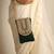 Green satin sling bag