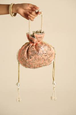 Peach satin potli bag 2