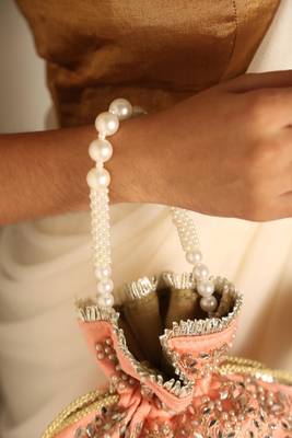 Peach satin potli bag 3