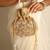 Beige satin potli bag