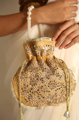 Beige satin potli bag