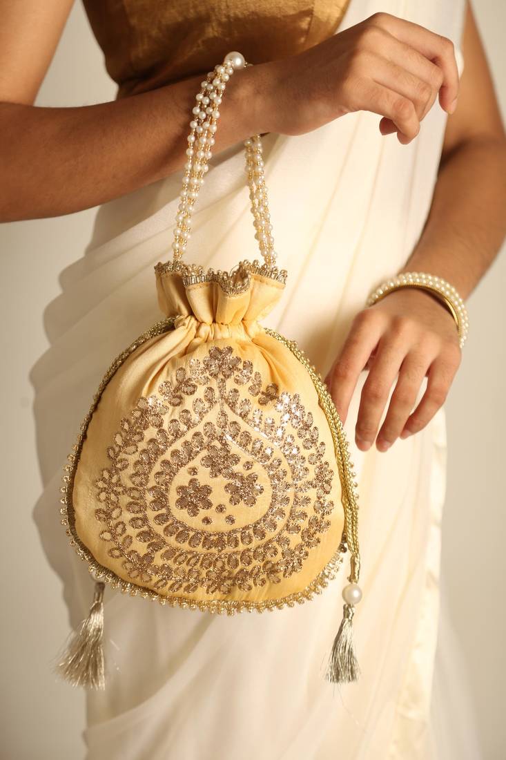 Beige satin potli bag