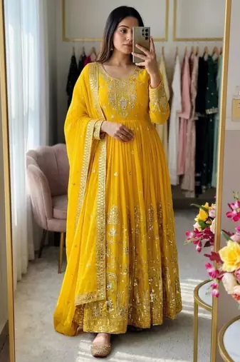 Yellow faux georgette embroidered flared gown set