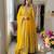 Yellow faux georgette embroidered flared gown set