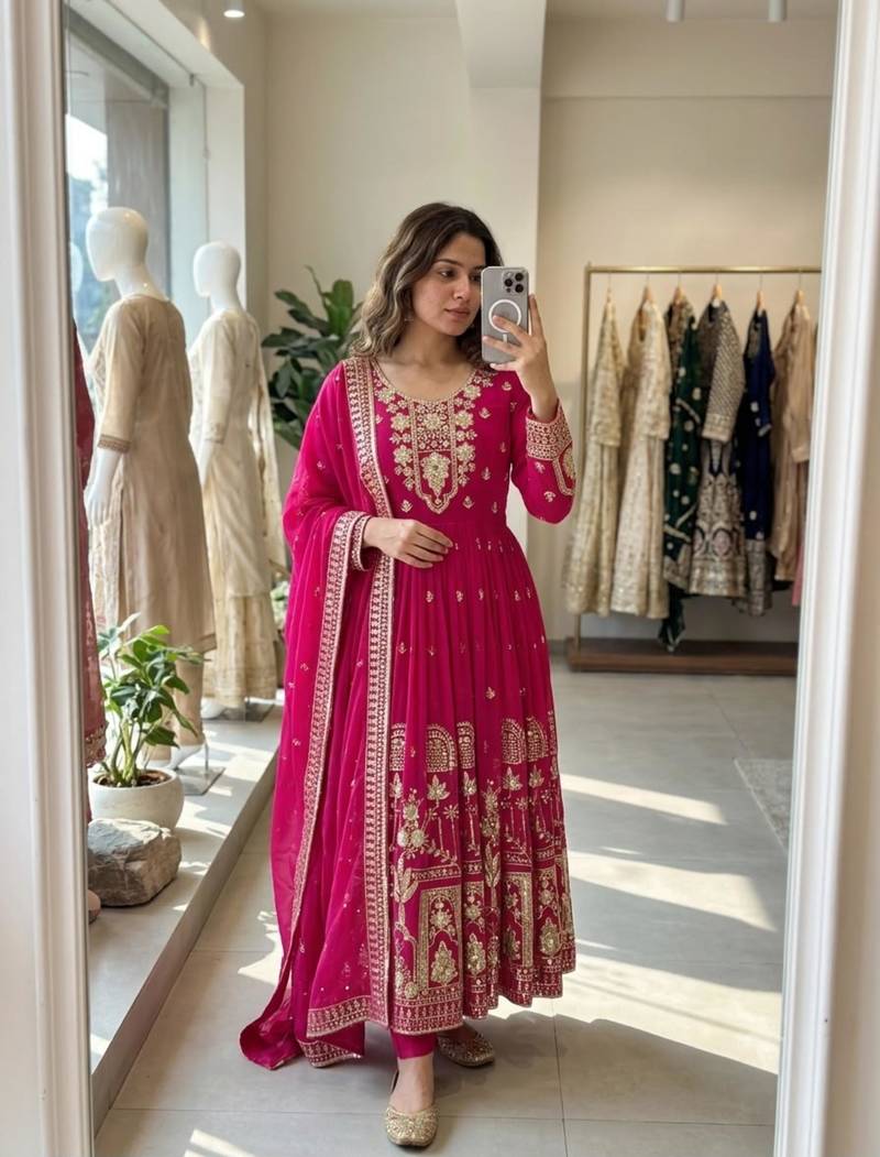 Rani-pink faux georgette embroidered flared gown set