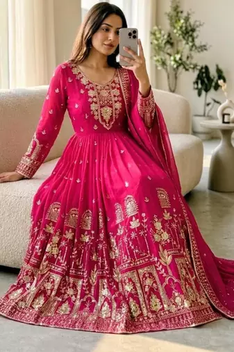 Rani-pink faux georgette embroidered flared gown set