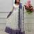 White georgette embroidered flared gown set