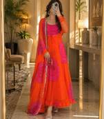 Orange faux georgette printed flared gown set