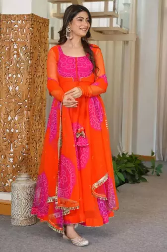 Orange faux georgette printed flared gown set