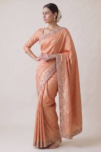appealing peach-coral embroidery work with real bits work banarasi silk blend indian saree with blouse