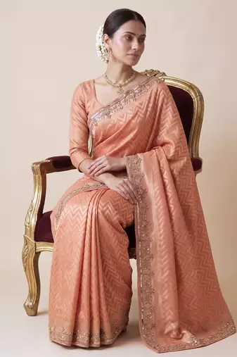 appealing peach-coral embroidery work with real bits work banarasi silk blend indian saree with blouse