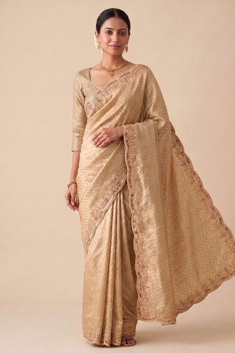 engaging beige-gold embroidery work with real bits work banarasi silk blend indian designer wedding saree