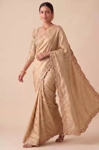 engaging beige-gold embroidery work with real bits work banarasi silk blend indian designer wedding saree