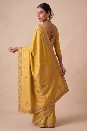 entrancing mustard yellow embroidery work with real bits work banarasi silk blend indian saree with blouse