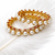 Pearl & ruby stone gold-toned bangles for women, set of 2 floral filigree design, traditional indian wear.