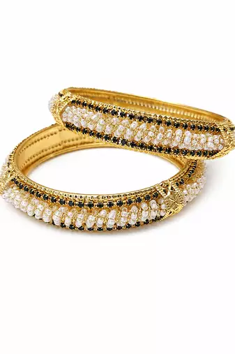 Gold-toned pearl bangle set with ruby & emerald stones set of 4 bangles, traditional design, festive wear.