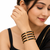 Gold-toned pearl bangle set with ruby & emerald stones set of 4 bangles, traditional design, festive wear.