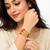 Gold-toned pearl bangle set with ruby & emerald stones set of 4 bangles, traditional design, festive wear.