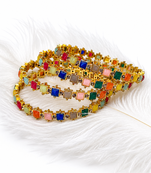 Gold-toned kundan bangles with teardrop stones, set of 2 filigree design, ethnic wear, white stone embellished.