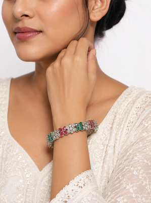 Silver-toned floral bangle set with red and green stones crystal embellished, marquise cut stones, set of 2 bangles. 2