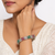 Silver-toned floral bangle set with red and green stones crystal embellished, marquise cut stones, set of 2 bangles.