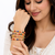 Gold-toned kundan bangles with teardrop stones, set of 2 filigree design, ethnic wear, white stone embellished.