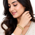 Gold-toned kundan bangles with teardrop stones, set of 2 filigree design, ethnic wear, white stone embellished.